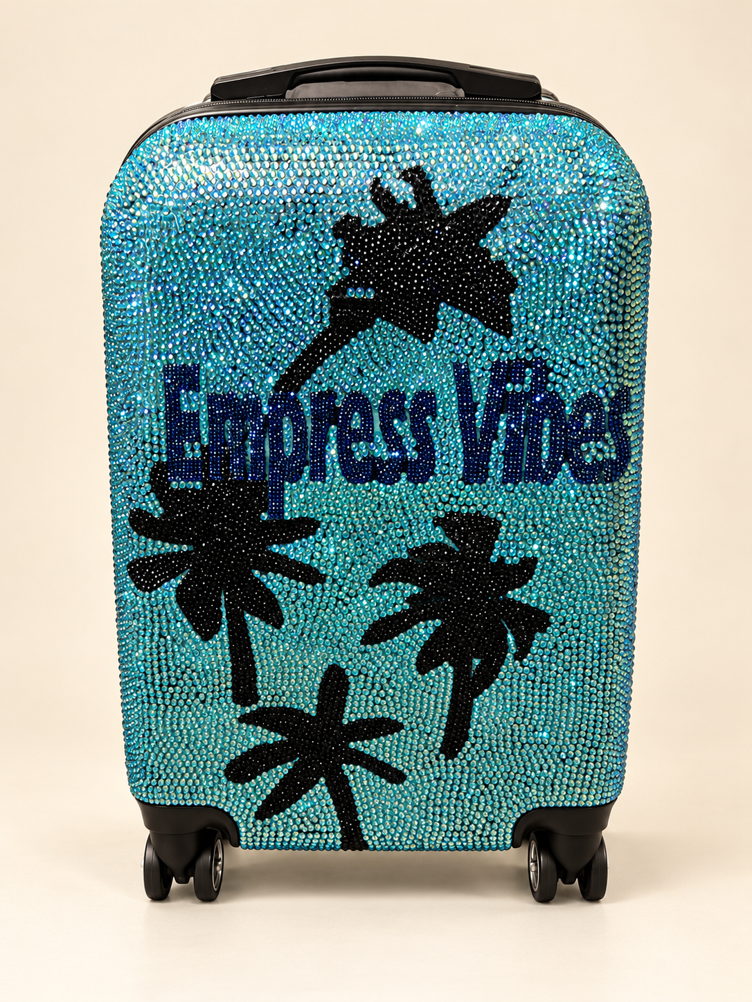 Turquoise crystal Empress Vibes suitcase with black fairy silhouettes